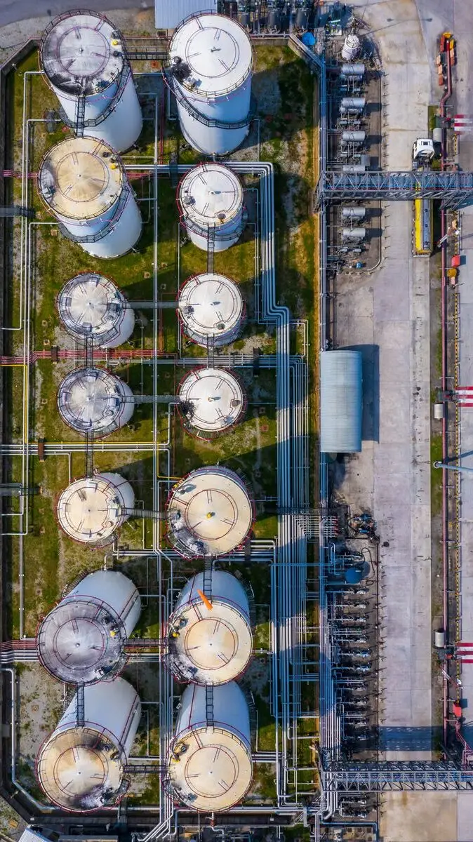 Aerial view storage tank and tanker truck in industrial plant, Chemical Industry.